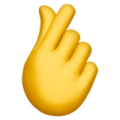 hand with index finger and thumb crossed on platform Apple