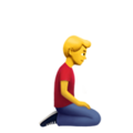man kneeling facing right on platform Apple