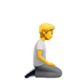 person kneeling facing right on platform Apple