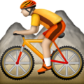 person mountain biking on platform Apple