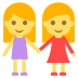 women holding hands on platform EmojiTwo