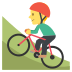 person mountain biking on platform EmojiTwo