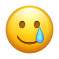 smiling face with tear on platform Emojipedia