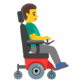 man in motorized wheelchair facing right on platform Google