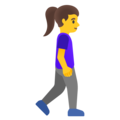 woman walking facing right on platform Google