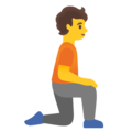 person kneeling facing right on platform Google