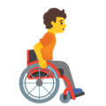 person in manual wheelchair facing right on platform Google