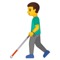man with white cane on platform Google