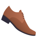 man’s shoe on platform JoyPixels