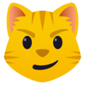 cat with wry smile on platform JoyPixels