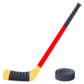 ice hockey stick and puck on platform JoyPixels
