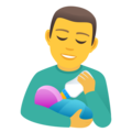 man feeding baby on platform JoyPixels